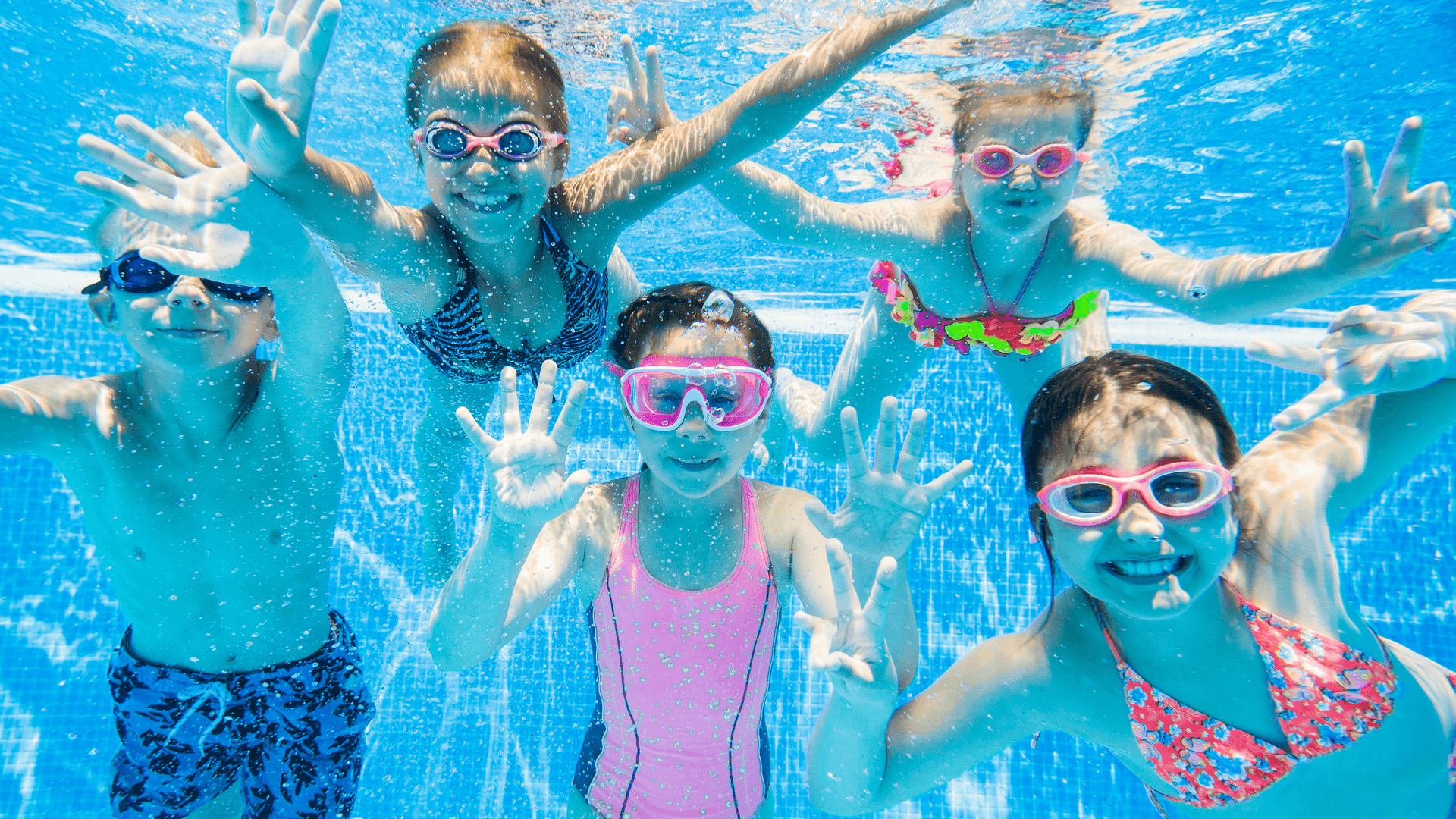 Group of 5 children in the pool